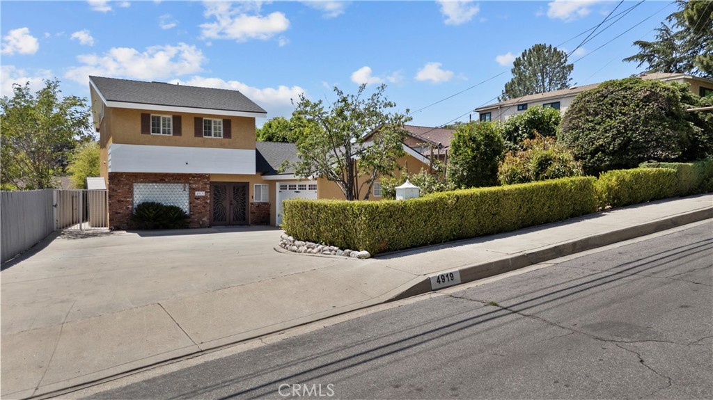 Welcome to this beautifully updated 3-bedroom, 2-bathroom two-story home located above Foothill Blvd in the highly sought-after La Crescenta community. The functional layout includes one bedroom on the main floor—perfect for guests or a home office—and two additional bedrooms upstairs connected by a Jack-and-Jill bathroom, offering both convenience and privacy. Inside, you’ll find a updated kitchen and bathrooms featuring modern, high-quality finishes throughout. Step outside to an entertainer’s dream backyard complete with a newly installed Pebble Tec beach-entry pool and a relaxing spa. Enjoy year-round outdoor living under the spacious covered patio, equipped with a fully functional outdoor kitchen, surround sound speakers, ceiling fans, and outdoor blinds—perfect for hosting or unwinding in style. Located in a peaceful neighborhood above Foothill Blvd, this home offers access to top-rated schools, scenic trails, and the charm of the Crescenta Valley lifestyle. Don’t miss this rare opportunity to own a true entertainer’s paradise in one of La Crescenta’s most desirable pockets.
