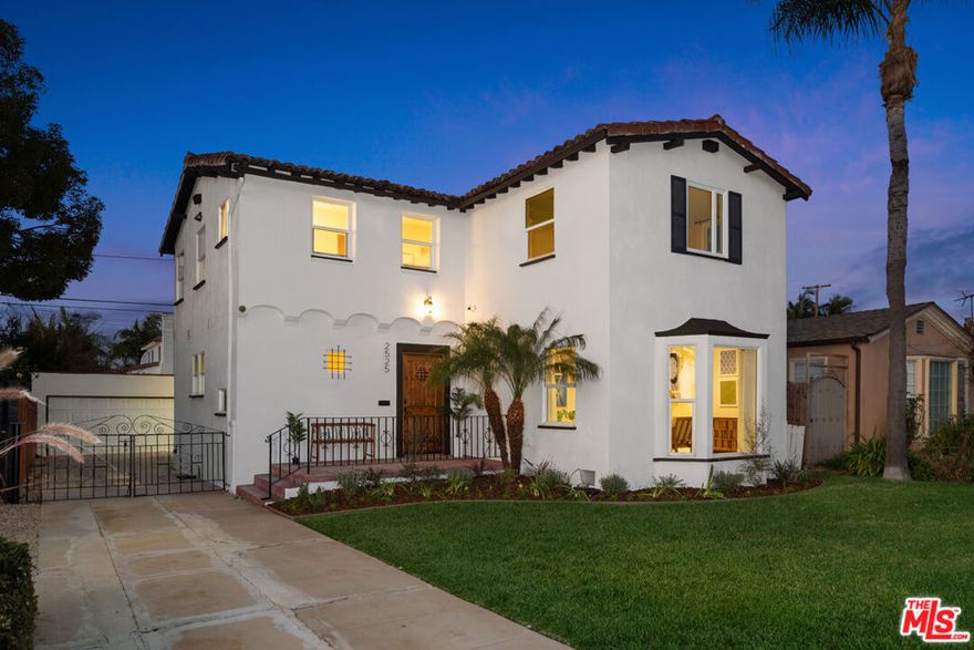 Welcome to 2525 W 81st Street, a beautifully updated 4-bedroom, 3-bathroom home in Inglewood's highly desirable Morningside Park neighborhood, just two blocks from Circle Park. This 1930s Spanish-style residence blends timeless character with modern upgrades across 1,952 sq. ft. of living space on a spacious lot offering inviting front and back yards.  Step inside to a bright and welcoming living room highlighted by a charming front bay window and an original stone fireplace with a classic hearth.  The open-concept dining area features stylish wainscoting, designer wallpaper, and a contemporary light fixture, creating an ideal space for everyday living and entertaining.  Throughout the home, unifying neutral luxury vinyl plank flooring and recessed lighting provide a fresh, cohesive look.  The large, open kitchen has been thoughtfully updated with stainless steel appliances, quartz countertops, and white shaker cabinetry.  A convenient powder room is located near the entryway.  A spacious primary suite includes sliding glass doors that open directly to the private backyard, along with a beautifully updated en-suite bathroom featuring a double vanity and a walk-in shower.  Three additional bedrooms offer generous space and abundant natural light, and the full guest bathroom includes both a bathtub and a separate shower.  A grand Spanish-style staircase adds architectural drama and leads to the upper level, complementing the home's classic character.  The backyard is a true extension of the home  a wide, lush lawn and an expansive deck provide ample room for play, outdoor dining, and a conversation area, making it ideal for gatherings and relaxation.  A detached, finished two-car garage adds flexibility for parking, storage, or a potential creative space.  Located in a prime section of Inglewood, this home offers proximity to Los Angeles' premier sports and entertainment destinations including SoFi Stadium, The Forum, Hollywood Park, and the newly opened Intuit Dome.  It is also conveniently positioned between the 405 and 110 freeways, offering easy access to both the Westside and Downtown.  A rare opportunity to own a stunning Spanish-style home with modern comforts in one of Inglewood's most sought-after neighborhoods.