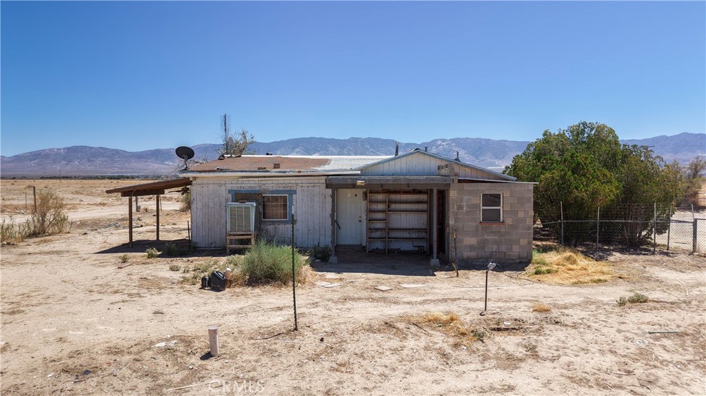 Investor’s Dream on Just Under 5 Acres! This is a rare opportunity to own a spacious piece of land with endless potential. Nestled on nearly 5 acres, this property features a 2 bedroom, 1 bathroom home that is ready for transformation. The structure is in need of cosmetic improvements and may also require more significant repairs, making it an excellent candidate for investors, flippers, or buyers looking for a project to bring their vision to life. The home is set back from the road, offering a sense of privacy and peace, while the wide-open acreage provides ample space for expansion, outbuildings, agriculture, livestock, or creating your dream homestead. Whether you're looking to renovate and rent, resell for a profit, or develop your own rural retreat, the options are wide open. Adding to its value, the property includes its very own private water well—a huge bonus for anyone looking to live off the grid or reduce utility costs. Located in an area where properties like this are hard to come by, it’s priced to sell quickly and won’t last long. Don’t miss out on this chance to own land, invest wisely, and create something truly special!