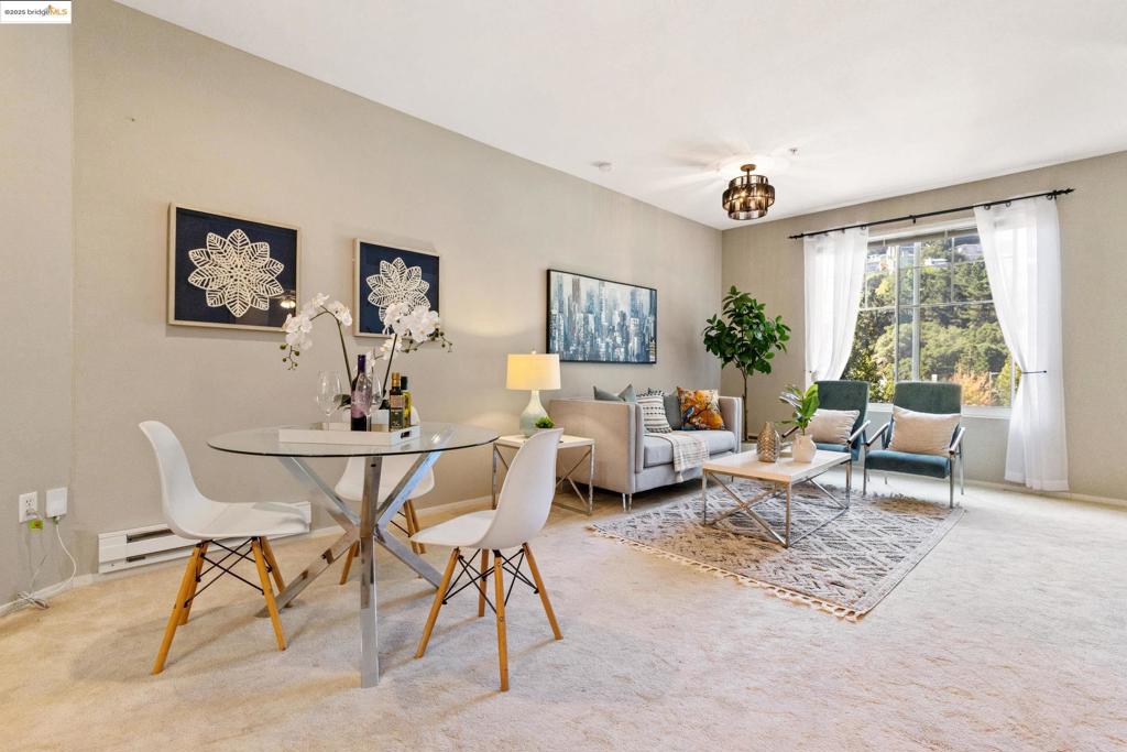 Nestled in the beautiful Oakland Hills, this perfectly sited residence is in the gated community with a pool of the Parkwoods on Caldecott Lane. offers an open floor plan with a gas fireplace, a private balcony, and oversized windows overlooking verdant hills, nature, and the multi-million dollar homes of the Claremont Hills. The spacious primary suite includes a walk-in closet, a spacious vanity, and sliding doors to its own patio shared with the main living area. The unit also offers in-unit laundry, ample storage, and one deeded parking space. The Parkwoods is a wonderful resort-style, pet-friendly community that includes an outdoor swimming pool, spa, sauna, well-equipped gym, large clubhouse, secured gated entrance, and nearby walking trails. Located close to major commuting and shopping options.
