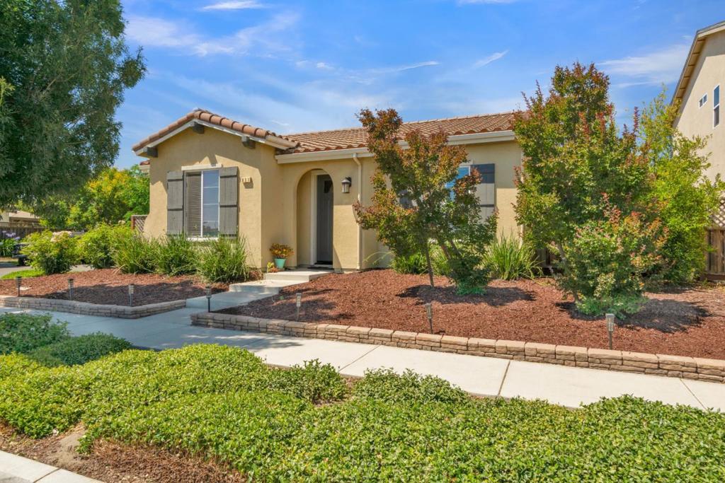 Welcome to this beautifully updated single-story home nestled on a desirable corner lot in the Nino Homes at Mills Ranch community in King City. This 4-bedroom, 2-bathroom gem offers the perfect blend of comfort, style and functionality. Step inside to find luxury vinyl plank flooring throughout the main living areas, with carpeting in the bedrooms for added comfort. The remodeled kitchen is a true centerpiece, featuring a spacious island, modern finishes, a pantry, and a conveniently located laundry room nearby. The primary en-suite offers a peaceful retreat with a walk-in closet and private bath. Outside, enjoy your personal oasis with a concrete patio, relaxing spa, gazebo, and planter beds perfect for gardening. A storage shed in the rear adds practical convenience. With a 2-car garage and great curb appeal, this home checks all the boxes. Don't miss the opportunity to own this thoughtfully updated property.
