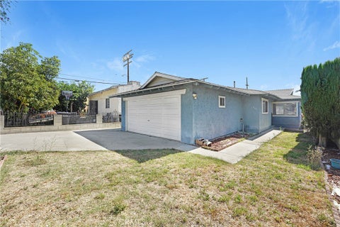 Photo of 926 S Brannick AVE, East Los Angeles, CA 90023 (MLS # CV26162909)