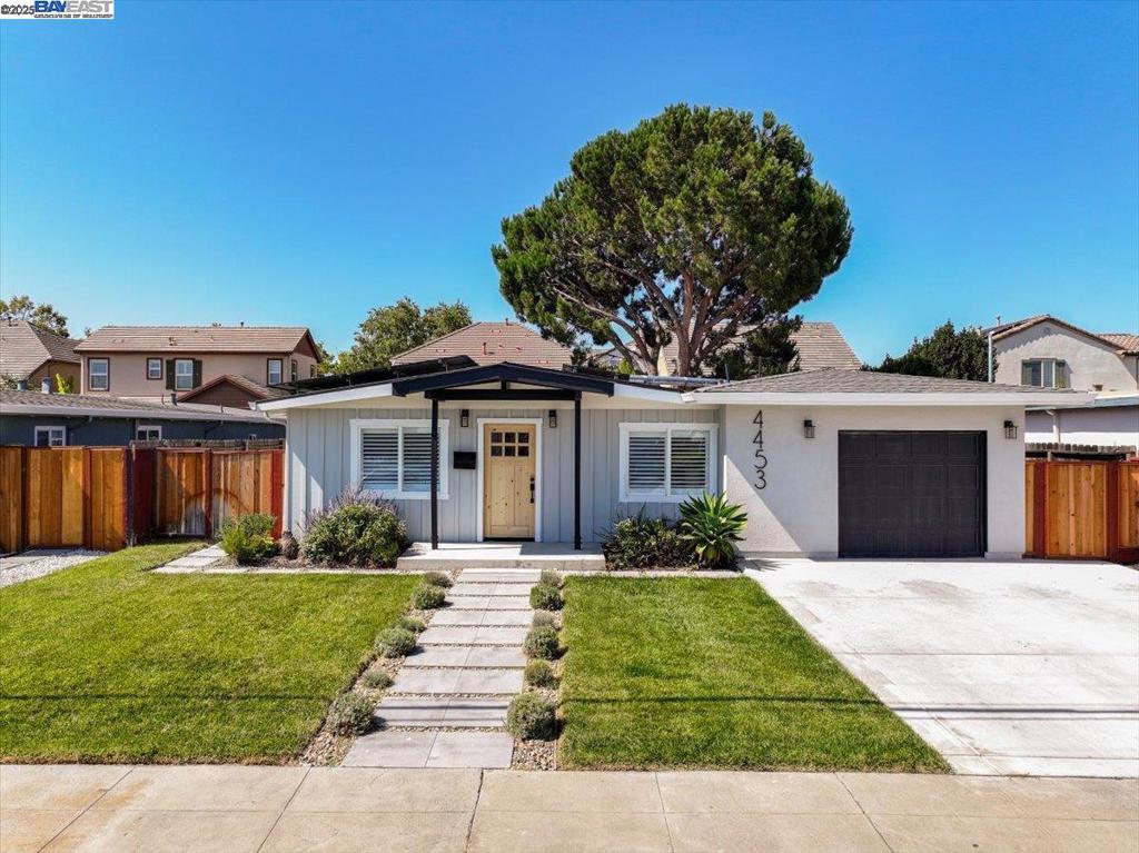 This GORGEOUS, EXPANDED, & REMODELED 3 bedroom, 2 bathroom home in the highly desirable SUNDALE neighborhood has so much to offer! Situated in the HEART of this FREMONT community, your future EAST FACING home has FANTASTIC natural lighting throughout & SO MANY BEAUTIFUL upgrades! From the GOURMET kitchen featuring QUARTZ counters, ELEGANT cabinets, brand new HIGH-END stainless steel appliances, & a LARGE farmhouse sink, to the ELEGANT laminate flooring throughout, to the SPACIOUS eat in area overlooking the patio; who can ask for anything more? The GRAND primary room with a RESORT STYLE bathroom featuring an OVERSIZED shower stall, dual vanities, & EXTRA-LARGE closet is a DREAM come true! And, having 2 additional rooms & COMMODIOUS bathroom makes this home PERFECT for a growing family or one that loves to host and have company! The backyard serves as your PRIVATE OASIS complete with a PLUSH patio, low maintenance turf, & a RESORT STYLE bar that is PERFECT for RELAXING & ENTERTAINING! Complete with modern solar panels, two TESLA power walls, built in TESLA charging station, & NEST thermostat, being close to the AWARD winning schools, shopping, restaurants, trails, parks, and ALL OF SILICON VALLEY; this CROWN JEWEL of the neighborhood is a 100% MUST SEE!!!