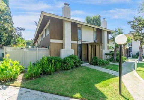 Photo of 15500 Tustin Village Way #103, Tustin, CA 92780 (MLS # CV26061886)