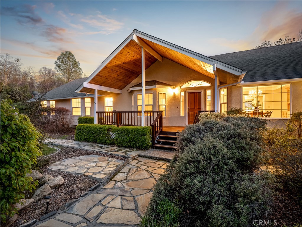 Discover this stunning custom-built 5-bed, 3-bath home spanning 3,315 sqft, perfectly designed for comfort & elegance. Nestled in arguably one of the best locations in Coarsegold, this home offers both privacy and easy access to main roads-a rare combination!Step inside to a spacious, open layout highlighted by vaulted pine ceilings & real hardwood floors in the main living area. The grand entryway welcomes you with a formal dining room on one side & a dedicated office on the other, creating a perfect balance of elegance & functionality. The expansive master suite features a huge walk-in closet and a luxurious master bath. The home is equipped with a newer roof & HVAC systems, plus owned solar, ensuring built-in utility savings.Outside, take in the gorgeous views from the beautiful redwood deck, or relax in the built-in spa. This home was intentionally built facing south, with abundant windows to maximize natural light. The curb appeal is unmatched with a striking entrance that welcomes you home. The property also features designated concrete work for basketball games, providing a fun & active outdoor space.For those needing extra space, the massive 5-car garage offers ample room, complete with built-in cabinets. The home is designed with fire safety in mind, featuring a hookup for a large firefighter hose & Rainbird sprinklers plumbed around the house for added protection. Additionally, an automatic full-house generator ensures uninterrupted power when needed.This exceptional home truly has it all!