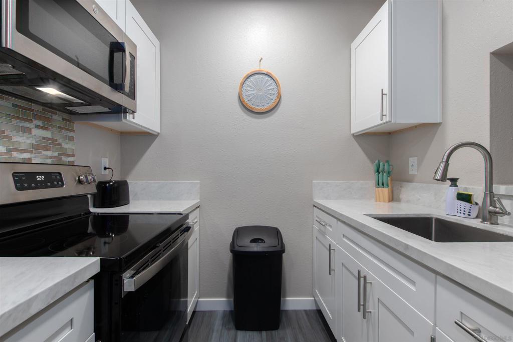 Completely renovated, fully furnished 1-bedroom, 1-bath apartment. This bright 450 sq ft unit features a sleek new kitchen with quartz countertops and stainless steel appliances, hardwood-plank flooring throughout, in-unit laundry, and new AC/heat. Located in a quiet neighborhood, you're less than 3 miles from the beach and just minutes from the Naval Base and local shopping (Vons, Walmart). Enjoy hassle-free living with 1 assigned parking spot included. Contact Katya at 305.965.84.93