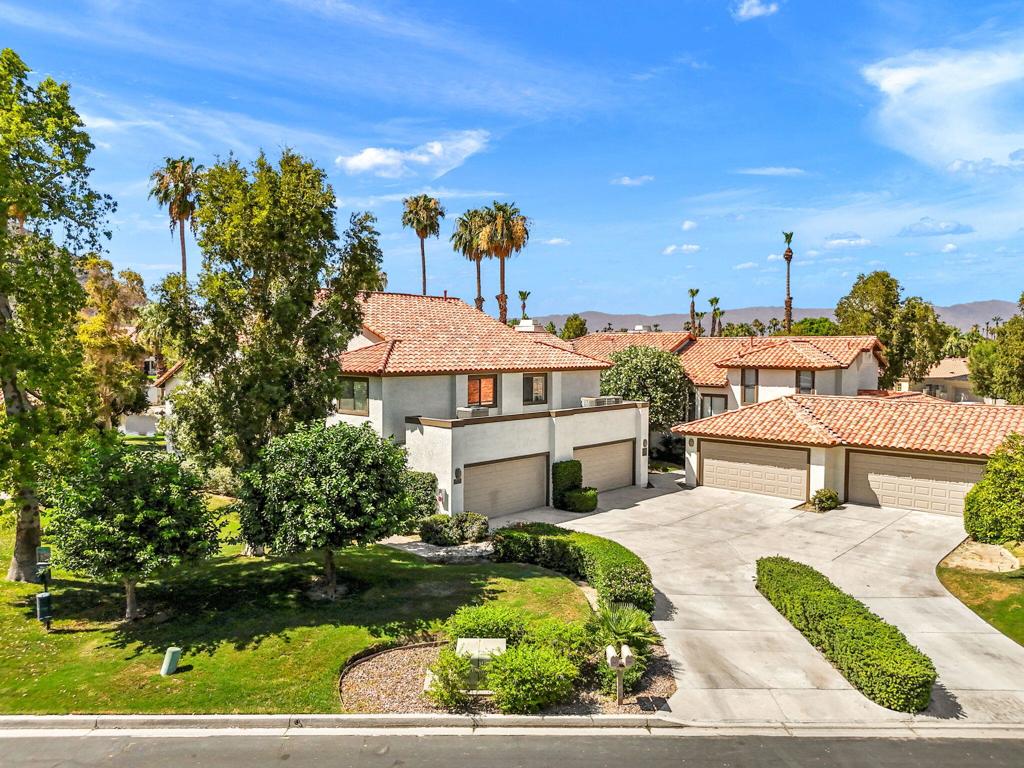 Welcome to 79822 Olympia Fields- stunning best describes this 3 bedroom, 3 full baths, VIEW & private corner lot in prestigious PGA West -Palmer Private community. Let's start with the Views this property sits on - An elevated pool area with waterfalls and Mountain Views. Truly a resort setting. Just a stone's throw away. Now the property - Immaculate, kitchen with quartz countertops, attractive backsplash, great SS appliances, and all 3 bathrooms are Beautifully Remodeled, and Turnkey furnished with Neutral tones. Cozy fireplace in family room overlooking that expansive view off your private patio. There's also a sweet den off the kitchen offering a quiet space for work, reading, etc. Naturally Bright! Bedrooms on an upper level with primary has a balcony on the View side. All bedrooms nicely appointed. Come enjoy the good life - for a vacation, seasonal rental... Flexible! Look forward to hearing from you!