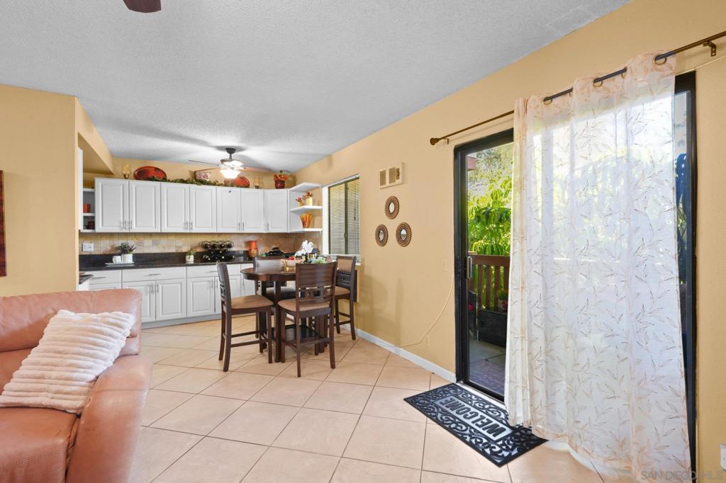 This well-maintained condo has been thoughtfully updated and offers a bright, functional layout. Inside, you’ll find a spacious floor plan filled with natural light, two full bathrooms, and a primary suite complete with a private bath and walk-in closet for added comfort and storage. The kitchen is equipped with granite countertops, a brand-new over-the-range microwave, and convenient washer and dryer hookups. Additional upgrades include recently replaced toilets, a newer water heater (just 2 years old), and fresh interior paint. With central A/C and ceiling fans, the home is designed for year-round comfort. Step outside and enjoy the convenience of being within walking distance to a shopping center that offers a grocery store, clothing shops, and plenty of dining options — from casual bites to everyday essentials. Perfect for first-time buyers, downsizers, or anyone looking for a move-in-ready home in a desirable San Diego neighborhood, this condo combines practicality, style, and location. Don’t miss your chance to make it yours!