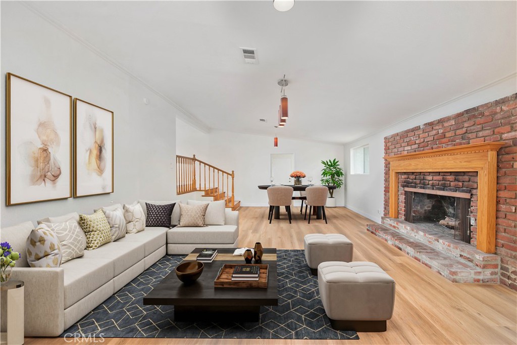 Welcome to a home that offers both comfort and possibility in the heart of Encino Park. This lovingly updated 4-bedroom, 2.5-bathroom residence features nearly 2,500 square feet of inviting living space on an oversized lot—over 1,000 sq ft larger than most in the neighborhood. From the moment you step inside, you’ll feel the warmth of its bright, open layout, complemented by brand-new flooring and thoughtful touches throughout. The main living area includes 3 generously sized bedrooms and 1.5 baths, along with a spacious, light-filled family room centered around a classic brick fireplace—perfect for cozy evenings. The kitchen, with its cheerful breakfast nook, is ideal for casual mornings or catching up over coffee. There’s even space to convert the powder room into a full second bath, offering flexibility to grow with your needs. Separate living quarters with its own exterior entrance provide the perfect retreat—whether you're looking for private guest accommodations, multigenerational living, or a peaceful work-from-home setup, this versatile space adapts to your lifestyle.