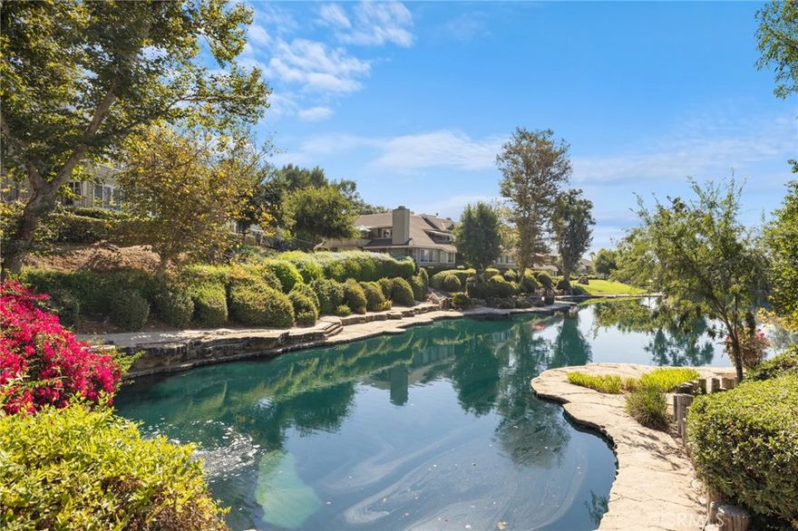 Welcome Home! This wonderful North Azusa Stair Free Condo is in the beautiful, one-of-a-kind Rainbow Lake Community. A secluded gated community with its very own private angling lake. This charming home features 1,347 sqft of living space, 2 bedrooms, 2 full bathrooms, a spacious balcony, a semi-attached 1 car garage and a second 1 car detached garage. This hillside unit has amazing views and plenty of natural light. The unit is ground level; there are no stairs to get in or out of the home. The bathrooms and bedrooms have been recently remodeled. And there is newer flooring throughout the home, as well as newer shutters on the windows. The kitchen features brand new counter-tops & backsplash, wall-to-wall cabinets, newer flooring, a dishwasher, oven and enough space for a small dine-in table. The living room has newer flooring, panoramic views and a lovely gas fireplace. The master bedroom has a large walk-in closet, balcony access and the master bathroom has a huge soaker tub. This is a very clean and move-in ready home in a very charming unique community. Community was just fitted with brand new Fiber Optic cabling. HOA is also in the process of revamping the community with fresh paint too. Hurry up, this one will not be on the market for long.