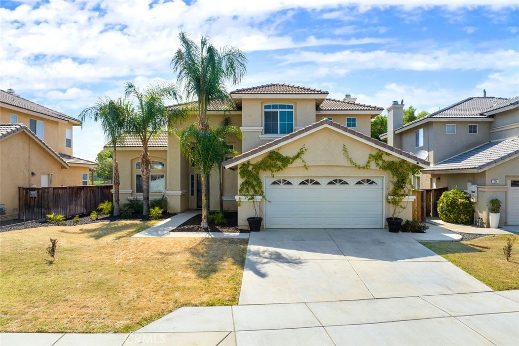 Welcome to your dream home in the growing community of San Jacinto! This stunning two-story residence offers a spacious and open Floorplan with 4 bedrooms and 3 bathrooms , with one bedroom and bathroom on the first floor. Step inside to discover a grand entrance with soaring ceilings and LVP floors that welcome you into a bright and airy living space. The living and dining area features contemporary fixtures and ample natural light, perfect for entertaining guests or relaxing with family. The stylish kitchen is equipped with modern appliances, handsome cabinetry, and sleek granite countertops,with custom backsplash, making meal preparation a delight. Adjacent to the kitchen, the cozy family room boasts a charming fireplace and direct access to the landscaped backyard where a covered patio offers an ideal setting for alfresco dining and leisure. Upstairs, the large master bedroom serves as a private retreat with its own ensuite bathroom, featuring a dual vanity, soaking tub, and separate shower. Additional bedrooms are generously sized and share a well-appointed full bathroom. Extra features include a large laundry room, an attached two-car drywalled garage with epoxy floor, and a tranquil garden space. This home is perfectly positioned in a friendly neighborhood near parks, schools, and shopping centers, providing all the essentials for comfortable living. Don’t miss the chance to make this fabulous house your new home!