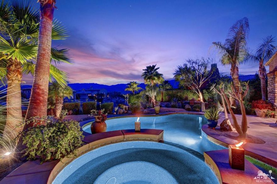 Just reduced! Open Fri Sat Sun 12-4 Click virtual media! Scenic 9-acre Recreational lake surrounded by 5 parks w/waterfall & a boat launch! Experience the elegant Santo Tomas lifestyle, the privacy of a gated community & the flair of Desert architecture on this Lakefront Paradise w/a Private dock & Spectacular Mountain Views! Prime South facing professionally landscaped backyard overlooking the lake is an entertainers DREAM! Enjoy privacy from one of the many destination patio areas or meander down the path to your Priv Dock for a sunset cruise on a kayak or boat! Priv pebble-tec saltwater Pool & waterfall Spa, 2 built-in firepits, Kitchen terrace has Built-in quartz BBQ island & sit-down bar.Low HOA of $320 includes Mission Hills CC Social, Tennis, Swim & Gym membership! Owned $52K Solar System. 3Bd 2.5 Ba, formal dining, kitchen w/island/great rm combination w/fireplace,butler's pantry. Enhancing night illumination,Crown Molding, Plantation Shutters,Silk Drapes & built-in speakers.