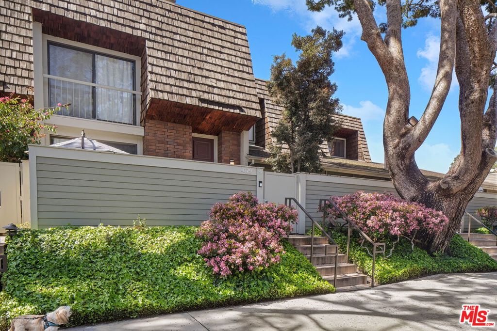 Moments away from the Marina, Abbot Kinney and Venice Beach, 4329 Redwood Avenue, Unit 4, is a completely renovated 2-bedroom, 3-bathroom townhome enjoying effortless access to parks, bike paths, surfing, and endless outdoor activities. Upon entering the home, high ceilings and an open-plan layout welcome you, creating a sense of spaciousness and an abundance of natural light throughout. The generous living room features access to the private front patio, a cozy fireplace and a projector screen, ideal for movie nights and entertaining guests. Recently renovated, the home features an upgraded kitchen with a new range and fridge/freezer, gorgeous quartz countertops and backsplash, and a coffee nook built into the large pantry. Other renovations include new engineered wood floors throughout, new carpet in the bedrooms, new W/D in the laundry room, remodeled bathrooms with new vanities, lighting, freshly-tiled showers, and fully-paid earthquake retrofitting. The townhome has two generous bedrooms, inclusive of the primary suite with the space for a sitting area or nursery and a spa-like ensuite bath with separate shower and soaking tub. Park with ease in the attached 2-car garage with built-in storage and a direct entrance into the home. Located in the expansive, 12.7-acre gated community of Villa Velletri, this townhome offers a serene and secure environment for residents, along with four swimming pools, four spas, and a clubhouse. Don't miss this opportunity to rent in an unrivaled coastal community and live out your dream Westside lifestyle.