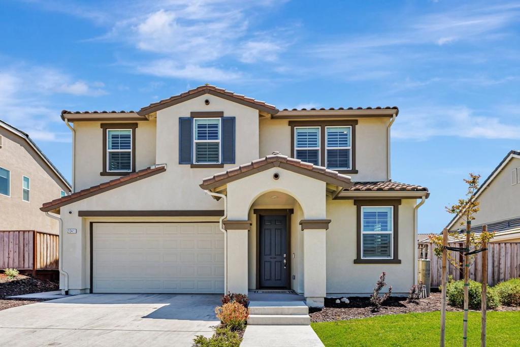 Welcome to this stunning home located in the desirable new Roberts Ranch community! Immaculate and practically brand new, this residence presents like a model home and is loaded with premium upgrades. Enjoy the benefits of owned solar, luxury vinyl plank flooring, custom louvered shutters, epoxy-coated garage floor, EV charging station, upgraded lighting, quartz countertops, and soft-close cabinetry throughout, and so much more! The thoughtfully designed floor plan includes a full bedroom and bathroom on the main level, offering ideal accommodations for guests or multigenerational living. The expansive kitchen features a large island, large pantry, and ample cabinet storage, all perfectly connected to the open-concept living and dining areas-perfect for entertaining. Upstairs, youll find a spacious loft-style second living area, a convenient laundry room, and three additional bedrooms, including the luxurious primary suite. Best of all, the landscaped backyard is complete...no waiting, no hassle. This ENERGY STAR certified residence is truly better than new and move-in ready with no HOA fees!
