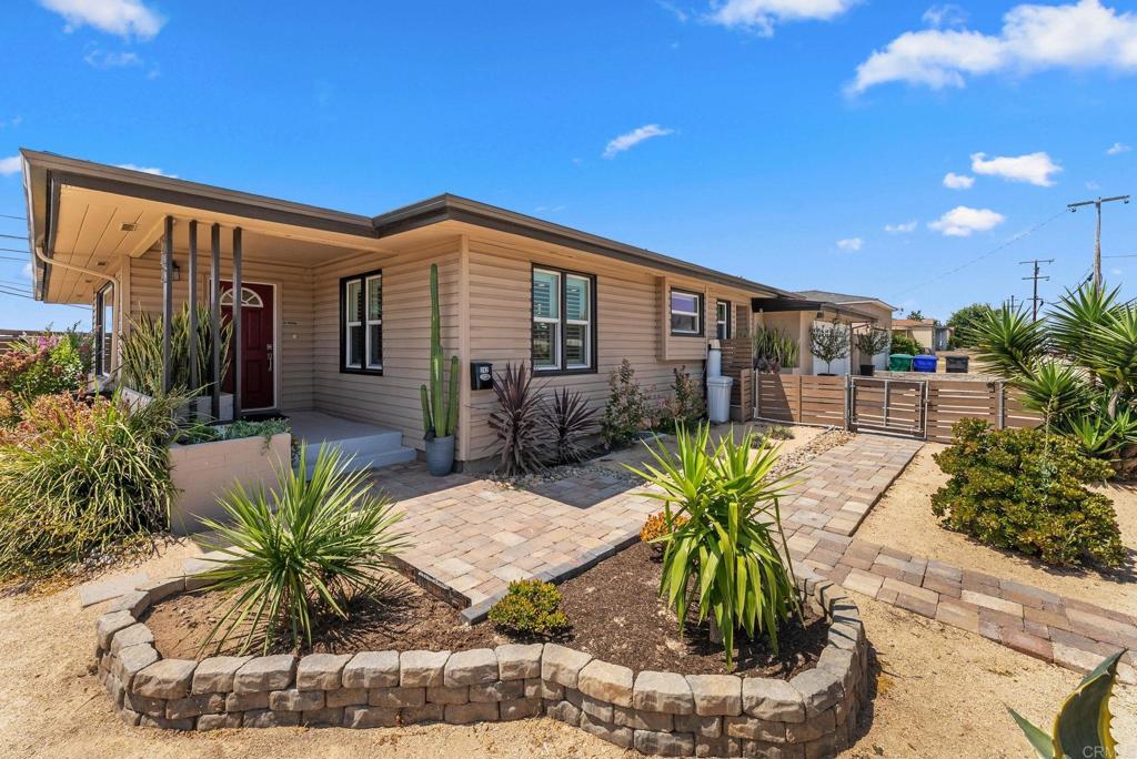 Stunning, fully remodeled home – ready for you to move right in! This beautifully updated residence has undergone extensive renovations, offering both modern style and long-lasting peace of mind. Updates include new dual-paned vinyl windows, recessed lighting, and laminate flooring throughout. The open kitchen and bathrooms have been tastefully remodeled with quartz countertops and Shaker cabinets, creating a light, bright, and open-concept atmosphere. Multiple large living room windows flood the home with natural light, creating a seamless flow from the inside to the outdoor patio—perfect for mixed-use indoor/outdoor living. Major improvements include foundation retrofit work, upgraded electrical and plumbing, a brand-new roof with an extra layer of insulation for temperature moderation, and a fully owned solar system (17 panels producing a total of 300W)—virtually eliminating your electric bill. The upgraded 200-amp service entrance supports an RV hook-up, EV charger, and RV sewer connection. Additional enhancements include a water conditioning system with RO drinking water, new garage door, solar tubes and skylights for natural lighting, gutters with rain barrels for water catchment, and newly added exterior walkways and a spacious rear patio. Enjoy year-round comfort with a new HVAC system and two new water heaters. The HUGE, fully fenced corner lot offers easy parking for hosting friends and family, a gardening shed, and 175 feet of decorative fencing. Landscaping blends low-maintenance desert-scaping in the front with lush tropical plantings in the back, creating a home that’s as inviting as it is functional. The water softener waste is even reused for front yard landscaping, making this a smart choice for eco-conscious living.