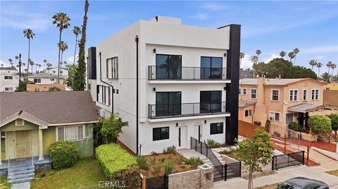 Photo of 1430 S Cloverdale Avenue, Los Angeles, CA 90019 (MLS # SB26103000)