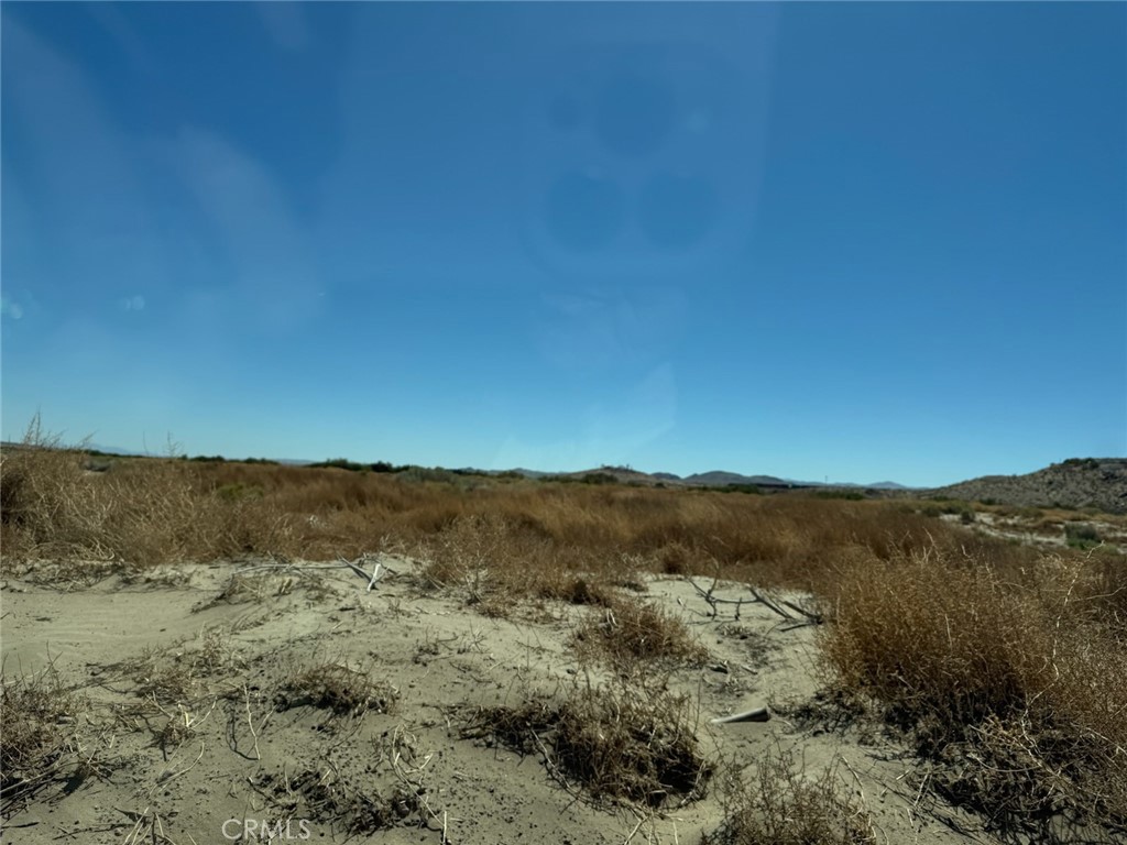 Prime Desert Land with Phase III Power & Paved Road Access - Ideal for Development or Investment! Discover the potential of this expansive parcel, perfectly situated just off a main route leading to the High Desert’s most popular cities.