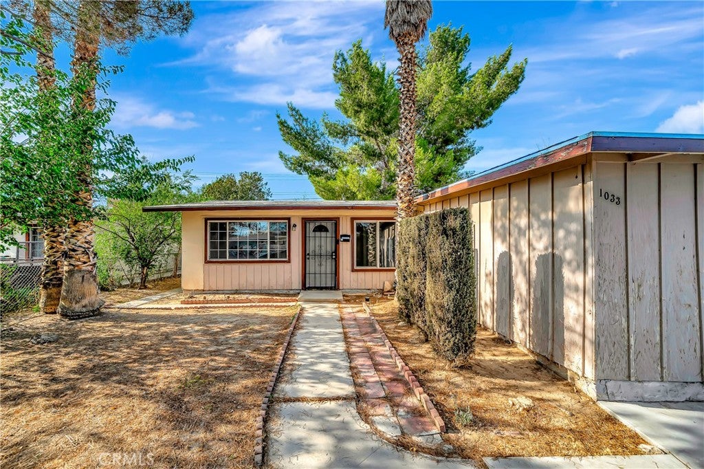 1033 W Holguin