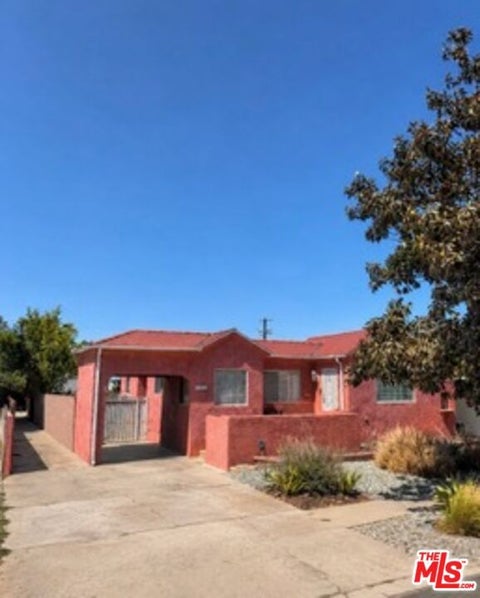 Photo of 1929 Carmona Avenue, Los Angeles, CA 90016 (MLS # 26845007)