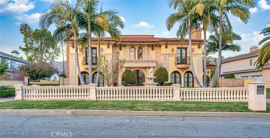 Nestled in one of Arcadia’s most prestigious neighborhoods, this magnificent south-facing Mediterranean-style estate offers unparalleled luxury and convenience. Set on a quiet street, yet just minutes from Westfield Mall, Santa Anita Racetrack, the Arboretum, Huntington Library, and Caltech, this home provides the perfect balance of privacy and proximity to key amenities.Upon entering, a grand dual marble staircase and exquisite Venetian plaster walls set the stage for timeless elegance. The home features three fireplaces, a spacious gym with a wet bar and film projector, and a breathtaking saltwater fish tank as its centerpiece. Outside, a tranquil Koi pond and resort-style swimming pool, thoughtfully designed with optimal Feng Shui, offer a serene escape.The expansive family room includes a built-in entertainment system and a stunning double-sided fireplace, ideal for hosting gatherings. The gourmet kitchen is equipped with a separate wok kitchen and walk-in pantry, catering to all culinary needs with ease. The backyard retreat is an entertainer’s dream, featuring a built-in BBQ, swim-up bar, and premium surround sound system, making it perfect for both entertaining and relaxation.  This estate includes five luxurious suites (including one on the main level), two libraries (one inside the master suite), and two laundry rooms (one upstairs and one downstairs). Climate control is effortless with five zoned air conditioning units, allowing for personalized comfort in every room. The five-car garage offers secure, coded access for ultimate convenience.  A rare opportunity to own this extraordinary estate, where luxury, comfort, and impeccable craftsmanship come together seamlessly.