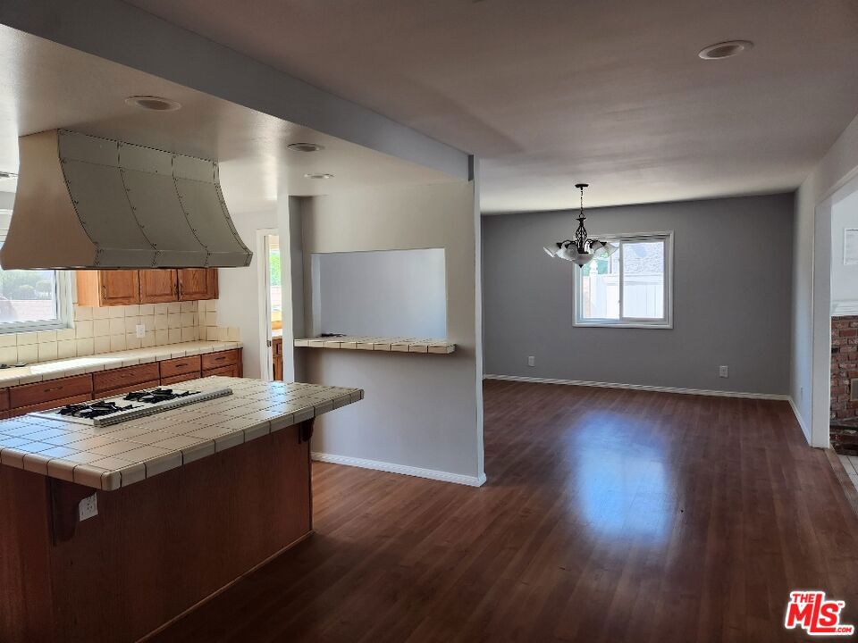 Gated entry with circular driveway. Open floor plan, large living room. Enjoy oversized kitchen with center island, breakfast bar, pantry, dining area. Recessed lights and ceiling fans. Primary bedroom with private bath and walk-in closet. Landlord will entertain leasing the home to businesses.