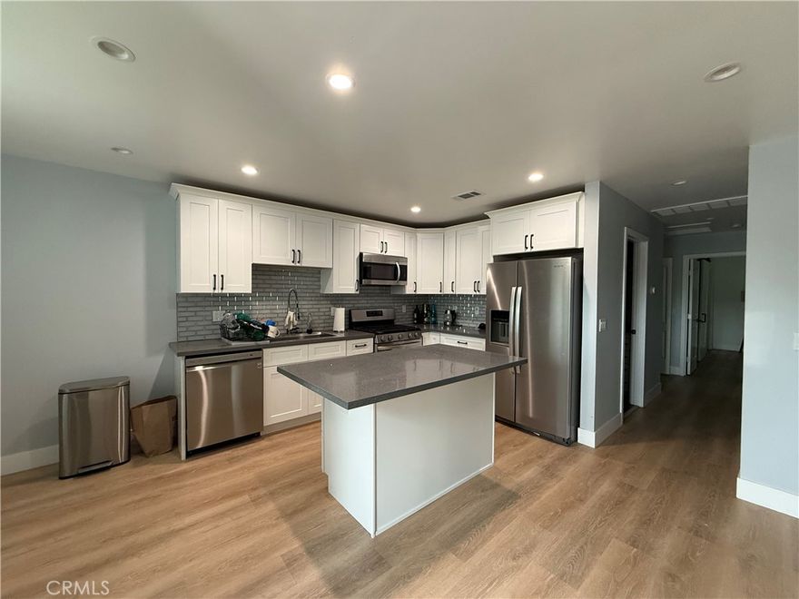 Discover modern comfort in this newly built 2-bedroom, 2-bathroom home in Winnetka! This elegant living space offers a chef’s kitchen with quartz counters, oversized island, custom cabinets, and stainless-steel appliances, plus a private laundry room. The primary suite offers a walk-in closet and a beautifully finished bath. Enjoy central heating and air, laminate flooring, and recessed lighting throughout. Relax in your private fenced patio with fruit trees. Added features: parking for 2 cars and solar system.