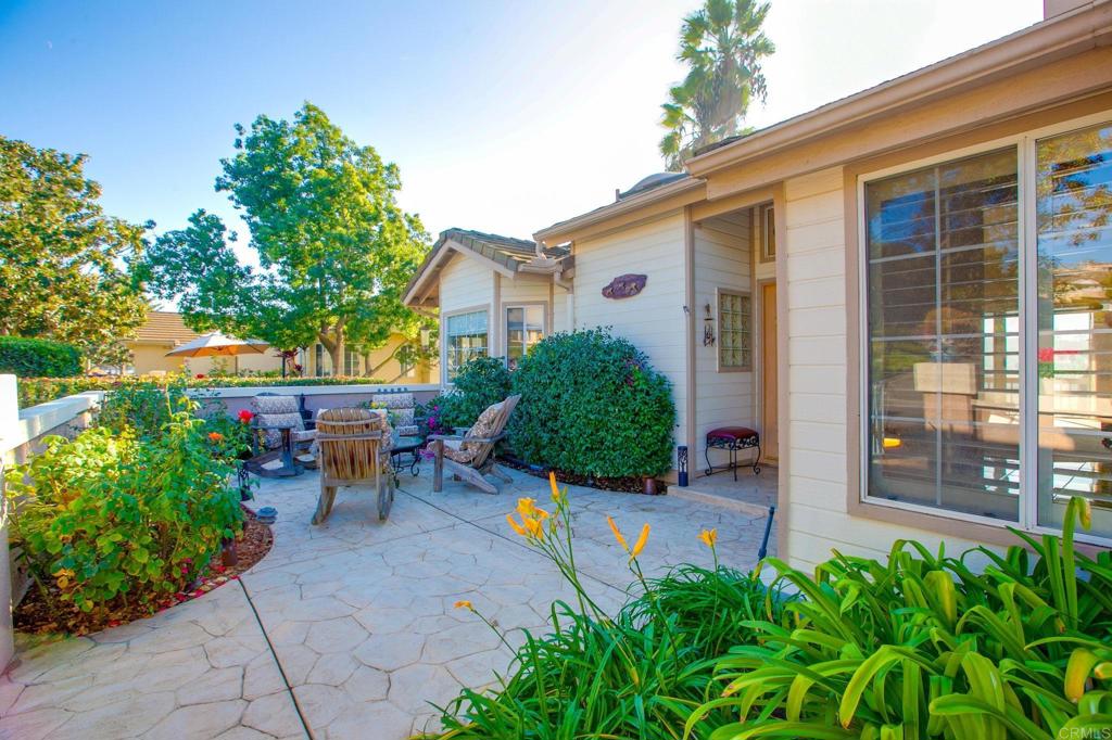 Nestled in the Hills of San Luis Rey Valley is a very quiet gated community called "The Terrace". Walk through a private front gate to a large garden patio, enter the front doors and it opens up to a foyer where you will be in awe of the bright open family room with vaulted ceilings and wall to wall windows with panoramic views of the mountains and overlooking the Prestigious San Luis Rey Training Center. The kitchen hosts quartz countertops and a garden window over the sink along with a bright kitchen nook. The main level includes the living room area with a warm fireplace, vaulted ceilings, a formal Dinning room, the master bedroom and a huge walk-in closet and a master bath and a half bath with laundry room and garage. A beautiful large deck that overlooks the training Center, enjoy your morning coffee and watch the Horses train, evenings you will enjoy the ocean breezes and sunsets. Downstairs hosts 2 large private bedrooms with private patios and a full bath. There is a locked storage area/workshop off the lower patio. The community has two pools, a private gated entrance, beautiful landscaping and friendly neighbors on their daily walks. You are centrally located and close to the freeways for easy access to restaurants and shopping and about 20 minutes from the Pacific Ocean.The Bonsall Schools are an award winning district, a small rural town in the beautiful county of San Diego.