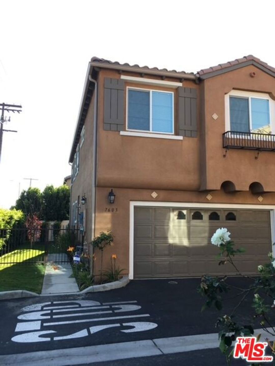 Beautifully maintained home in a highly desirable community, offering a bright and open floor plan with spacious living and dining areas filled with natural light. The modern kitchen features white cabinetry, stainless steel appliances, and a stylish mosaic tile backsplash, opening to a private patio perfect for outdoor dining or relaxation. The inviting primary suite includes dual vanities and generous closet space, complemented by two additional well-sized bedrooms ideal for guests or a home office. Additional highlights include an upstairs laundry area, wood-style flooring throughout, recessed lighting, dual-pane windows, and a light-filled upper landing with a skylight. A direct-access two-car garage adds convenience. Ideally located near shopping, dining, parks, schools, and major freeways, this move-in-ready residence blends comfort, style, and convenience in one of Van Nuys' most appealing communities.