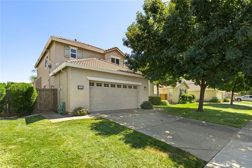 Nestled at the end of a peaceful cul-de-sac, this charming home offers everything you could ever want and more. Step inside and be greeted by elegant tile flooring, soft-toned walls, and an abundance of windows that fill the space with natural light. The generous living area features a cozy fireplace—perfect for gathering with loved ones or simply relaxing after a long day. Designed with the home chef in mind, the kitchen boasts rich cherry wood cabinetry, gleaming granite countertops, stainless steel appliances, and a gas range that makes cooking a joy. The spacious primary bedroom is the perfect retreat, offering ample space to unwind, a large closet, and a private en suite bathroom complete with dual sinks and a beautifully tiled walk-in shower. Additional features include ceiling fans throughout, a designated dining area, an indoor laundry room, and an attached two-car garage for added convenience. Step outside to the backyard where you’ll find the perfect setting for summertime barbecues, relaxing on the patio, or tossing a ball for your four-legged companion. With its prime location, thoughtful layout, and extensive list of amenities, this home truly has it all!