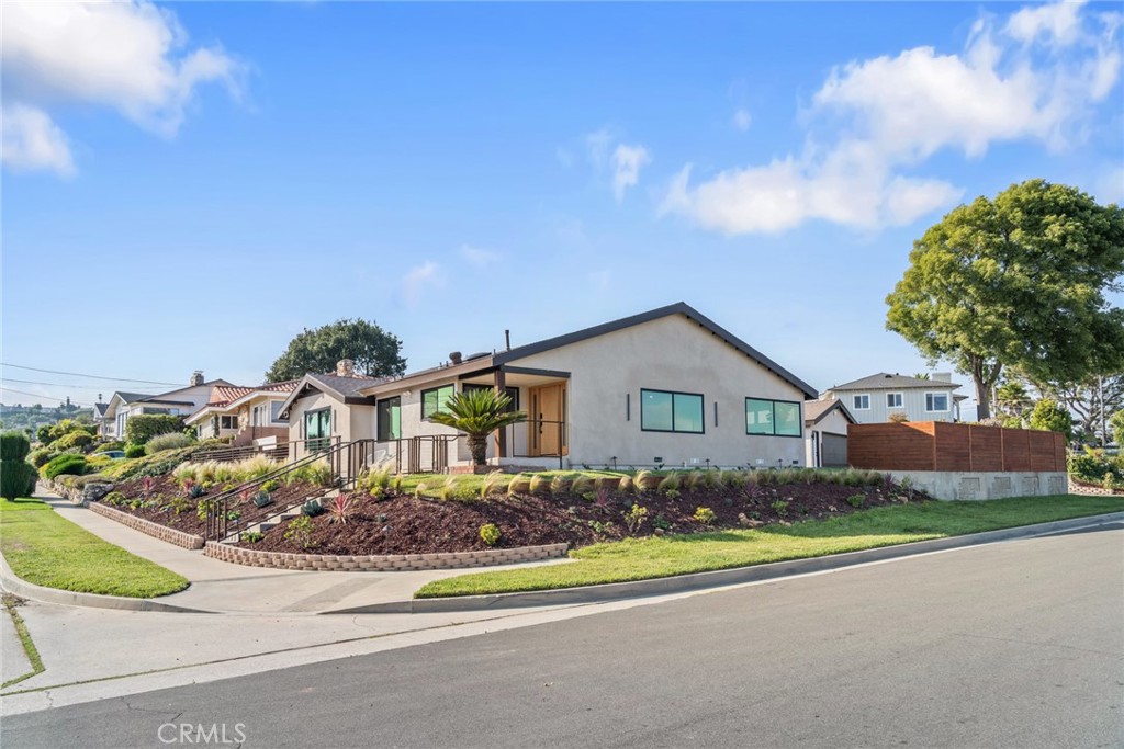 Welcome to one of the most family oriented neighborhoods in Rancho Palos Verdes. There are 125 homes in El Prado Estates and residents enjoy walking, hiking, kite flying and just sitting on the bench at Dean Dana's Friendship Park. Enjoy the views of the Pacific Ocean, Catalina, Parkland and cities of San Pedro and Long Beach. This fully remodeled home boasts a 5 bedroom 4 bath home that has 2 Master Bedroom suites with a walk-in closet. The kitchen has all new appliances and a large Island with sink. There is a kitchen walk-in pantry. You will find a Thermador six burner gas stove and Viking dish washer, refrigerator and microwave. The flooring is wood and porcelain tile. Modern light fixtures in the bathrooms and double sinks in both master baths. Views of the ocean from several locations. A 220 Volt plug in the garage for electric vehicles.
Minutes from elementary and intermediate schools, fine dining, and shopping. A 5-to-10-minute ride to the harbor freeway and the new Harbor West development (currently under construction).