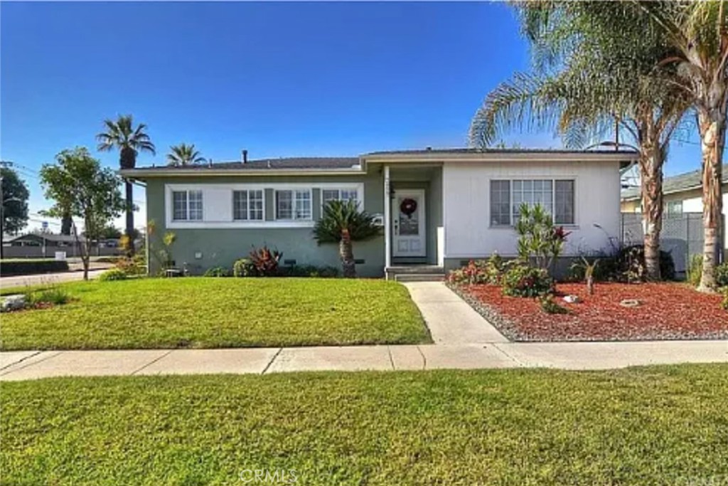Welcome to this delightful and appealing family home In the heart of Buena Park neighborhood with excellent curb appeal. this home offers 4 bedrooms 3 full baths, 2 master bedrooms with baths. Bamboo flooring. Storage unit available in the back yard. Indoor laundry attaches to the kitchen with newer washer and dryer. heath and A/C. Beautiful back yard fit for entertaining and family gatherings. Complete with turf, mini golf seating area al fresco and fire pit, storage in the back patio. Walking distance to Buena park mall, grocery stores, restaurants, Buena park library, minutes away from award-wining schools, including Walker Junior high and Oxford/ Kennedy High School. Conveniently located near 91 freeway