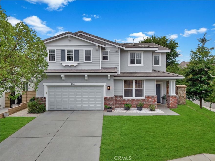 This immaculate North Lake STUNNER has been beautifully updated and sits on a corner lot in a welcoming cul-de-sac street with OWNED SOLAR! It can also be sold almost fully FURNISHED! The exterior of the home has just been freshly painted and boasts nearly 3,000 sf of light and bright living space featuring 4 bedrooms, 3 FULL bathrooms, a bonus room/office, loft, office nook, and 3 car tandem-garage. You have a downstairs bonus room/office with glass French doors currently used as a salon with its own sink and could easily be converted to a 5th bedroom, which would be convenient with a full bathroom downstairs. The living room flows seamlessly into your open concept kitchen which opens up to the separate family room featuring beautiful built-in shelving and a fireplace adding the perfect touch to the home's coziness and comfort. Your kitchen features granite countertops, a center island, elegant two-tone cabinetry with champagne bronze hardware, a gas stovetop, range hood, microwave, oven, pantry, and a stainless steel fridge included in the sale. Head upstairs where you have a spacious loft with ceiling projector and screen, a dedicated office nook, laundry room, all 4 bedrooms, and 2 more full bathrooms. Your primary suite has high ceilings, a BALCONY to soak in beautiful sunset views, and double barn doors to a very spacious bathroom with a remodeled walk-in shower, soaking tub, spacious walk-in closet, and double sink vanity with separate make-up station. Your laundry room is conveniently located upstairs with its own sink and  washer/dryer included. Your backyard features a covered patio, plenty of grass, a playground, spacious side yard, and views! The HOA amenities include a clubhouse, swimming pool and spa, basketball court, picnic area, playground, and large grass field. Also nearby is the renowned Castaic Lake, Castaic Sports Complex, Castaic Aquatic Center, and plenty of restaurants, strip malls, and award-winning schools. Schedule your showing to see this rare gem before it's gone!