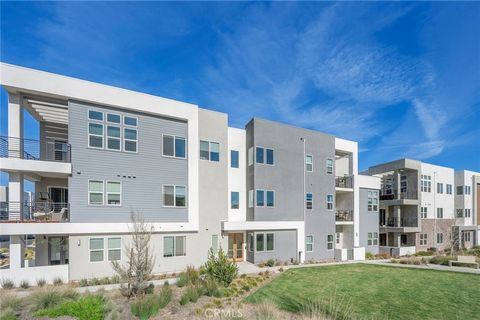 Photo of 27225 Cranmore Way #101, Valencia, CA 91381 (MLS # SR26049299)
