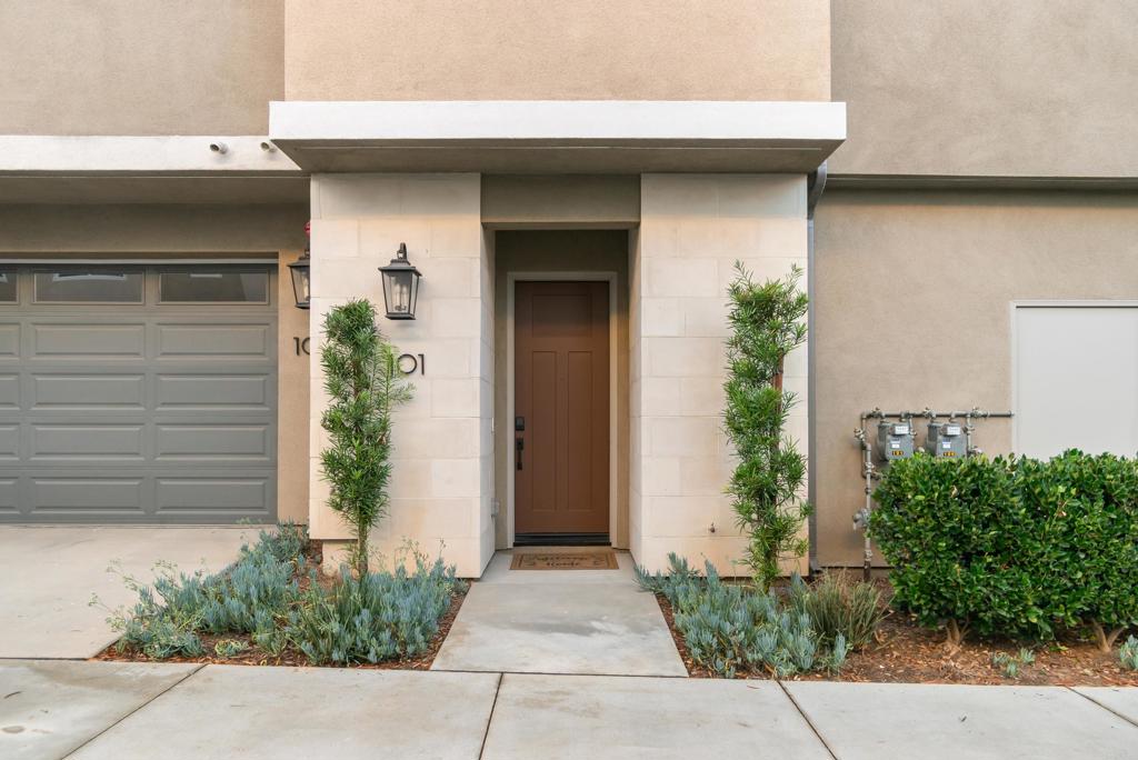 Great opportunity to own in the desirable community of Sunrise in San Marcos. This sought after plan, 3 bedrooms, 3 bathrooms townhome offers first floor foyer entry that leads you to the second level of this charming townhome featuring an open concept floor plan filled with natural sunlight, spacious living space, balcony to complement, a gourmet kitchen that includes stainless appliances, upgraded fixtures, stunning quartz countertops with subway tile backsplash, and custom cabinetry with ample storage. Additionally, the 2nd floor features a bedroom with a walk in closet and full ensuite bathroom. The third floor boasts two additional bedrooms and laundry closet with top of the line appliances. The primary bedroom includes two large walk in closets and ensuite bathroom with dual sinks and custom tiled shower. Additional bedroom includes a walk in closet and ensuite bathroom with a tub/shower combo. Other home features include PAID solar, electric car charging station, A/C, smart home features and more! This gated community includes a pool, spa, BBQ, tot lot, playground, and is ideally located with easy access to shopping, freeways, restaurants and award winning schools.
