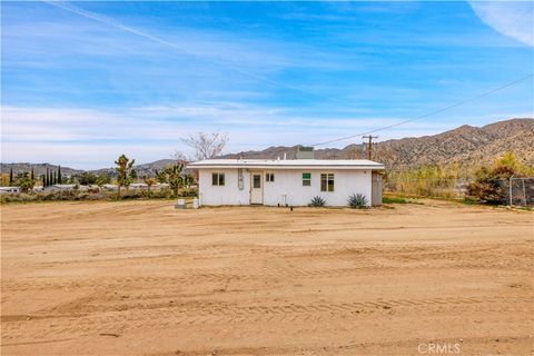 Photo of 7124 Wall Street, Yucca Valley, CA 92284 (MLS # JT25281219)