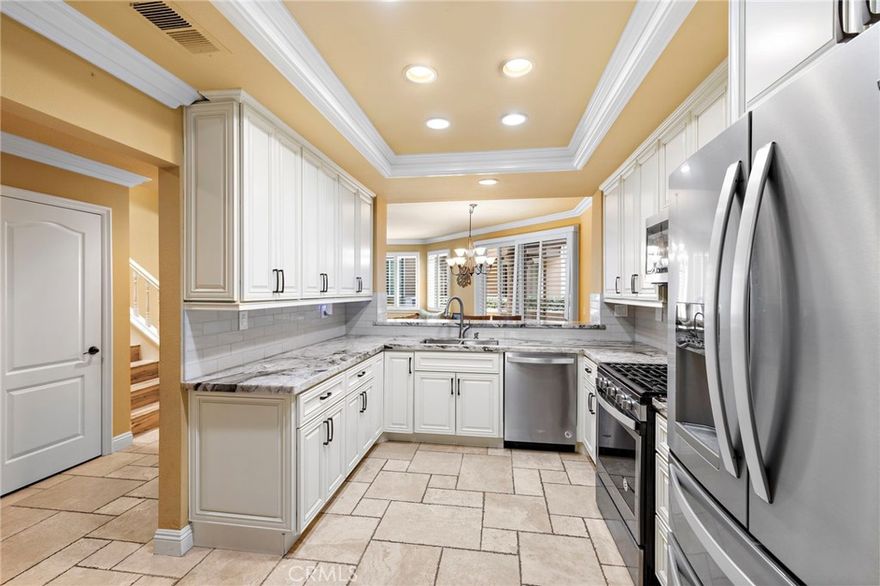 Three full bedrooms, Three full baths, Two Garages, Indoor Laundry

Welcome to a home that is more than a residence — it’s a lifestyle. Tucked inside the prestigious gated community of Lake Forest, this beautifully reimagined three-bedroom, three-bath retreat offers nearly 1,928 square feet of refined living, seamlessly blending elegance, comfort, and modern convenience. With two garages, an interior laundry room, and exclusive access to the Lake Forest Beach and Tennis Club, this property truly checks all the boxes.



From the moment you step inside, soaring cathedral ceilings, skylights, and walls of windows flood the home with natural light, illuminating fresh designer finishes throughout. Every detail speaks of sophistication, from the travertine floors and crown molding to the striking marble countertops and high-end natural stone accents. The bathrooms feel like private spas, designed with timeless basket weave tile, dual shower heads, and luxury finishes that turn everyday routines into indulgent rituals.



The gourmet kitchen is both a showpiece and a gathering space, featuring stainless steel appliances, custom cabinetry, and dramatic marble surfaces that make entertaining effortless. Open living and dining areas flow naturally to a covered patio, while the private balcony off the primary suite invites quiet mornings with coffee, sunset views, and tranquil evenings.



Just steps from your door, enjoy the shimmering pool and serene lakefront — where mornings begin with dew rising off the water and end with the peace and beauty only lakeside living can offer. Inside, thoughtful upgrades abound: recessed lighting, new windows, plantation shutters, and fresh paint create a move-in-ready environment with lasting appeal. The versatile layout with two master suites and a flexible guest room provides both comfort and options for modern living.



Life on Jasper Lake Lane means more than just a home — it’s resort-style living every single day. Take advantage of sparkling pools, tennis courts, lake access, and a private clubhouse complete with a newly renovated lagoon. Here, every day feels like a getaway.



This is more than a house. It’s a sanctuary of beauty, comfort, and inspiration — a rare opportunity to own not just a home, but a way of life.