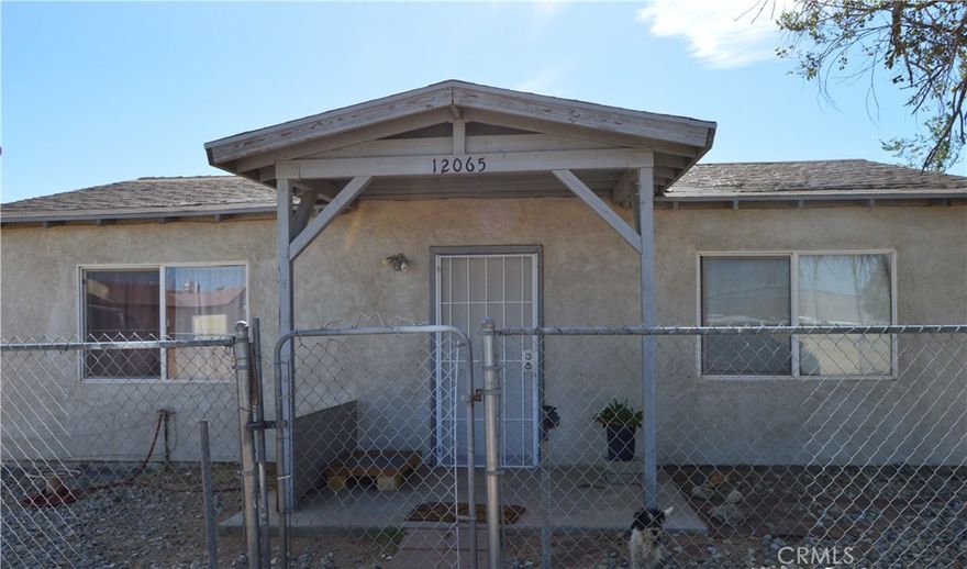 Beautiful cozy 2-bedroom 1-bath home, 873 sf plenty of room for your toys or tools. There is plenty of space for additional buildings or increase rooms into the home. Carport in the front side of the home.
