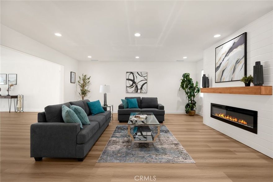 Welcome home to this fully renovated 5-bedroom, 3-bath single story residence that sits on a quiet, well-maintained street in one of West Covina’s most desirable neighborhoods. Every detail has been thoughtfully updated to create a modern, comfortable, and move-in ready space.  Step inside and enjoy the bright, open floor plan filled with natural light. The gourmet kitchen is the heart of the home, featuring oak-tone shaker cabinetry, quartz countertops, and brand-new LG stainless steel appliances. Multiple living and sitting areas provide plenty of room for everyday living, relaxation, and entertaining guests. Each bathroom has been tastefully redesigned with stylish fixtures and finishes. The spacious bedrooms include generous closets, with the primary suite offering a private ensuite bathroom and a large walk-in closet for ultimate comfort. This home is packed with upgrades, including: Waterproof luxury vinyl plank flooring throughout, dual-pane energy-efficient windows, central air and heat with all-new ductwork, new 200 AMP electrical panel, brand-new roof with a 10 year warranty, new copper plumbing, a new tankless water heater, new lighting, ceiling fans, a detached 2-car garage with new door, motor, and remotes (with possible ADU potential), a driveway long enough for an RV and all your toys, and even section 1 termite clearance is provided.  The backyard is a true retreat, featuring a freshly plastered pool with new filter, pump, and heater—perfect for summer fun. Professionally landscaped front and back yards with fresh sod, mulch, plants, and an automatic sprinkler system make outdoor living easy and enjoyable. Conveniently located near excellent schools, shopping, dining, public transportation, and major freeways, this home offers the perfect balance of comfort and convenience. Don’t miss this stunning West Covina gem with upgrades throughout—it’s move-in ready and waiting for you!