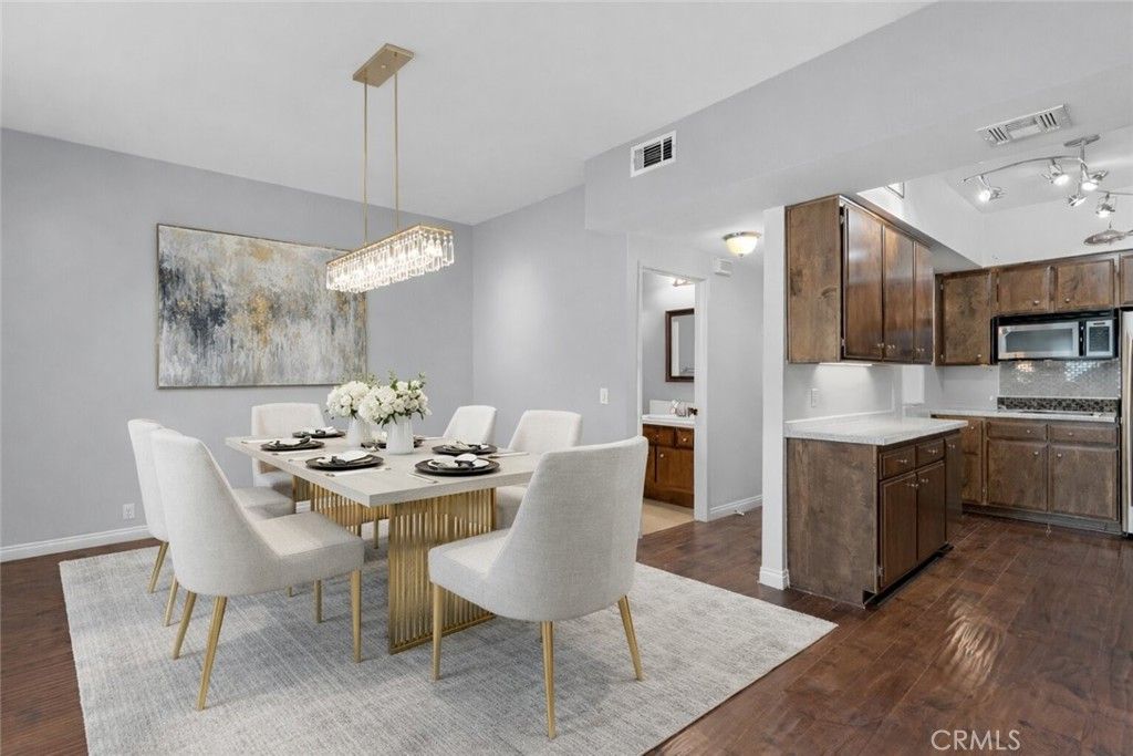 Photo of 6323 Reseda Blvd #13, Tarzana, CA 91335 (MLS # SR26008556)