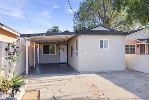 Photo of 12118 Barnwall St, Norwalk, CA 90650 (MLS # DW26061658)