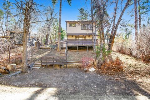 Photo of 43103 Grizzly Rd, Big Bear Lake, CA 92315 (MLS # DW25274182)