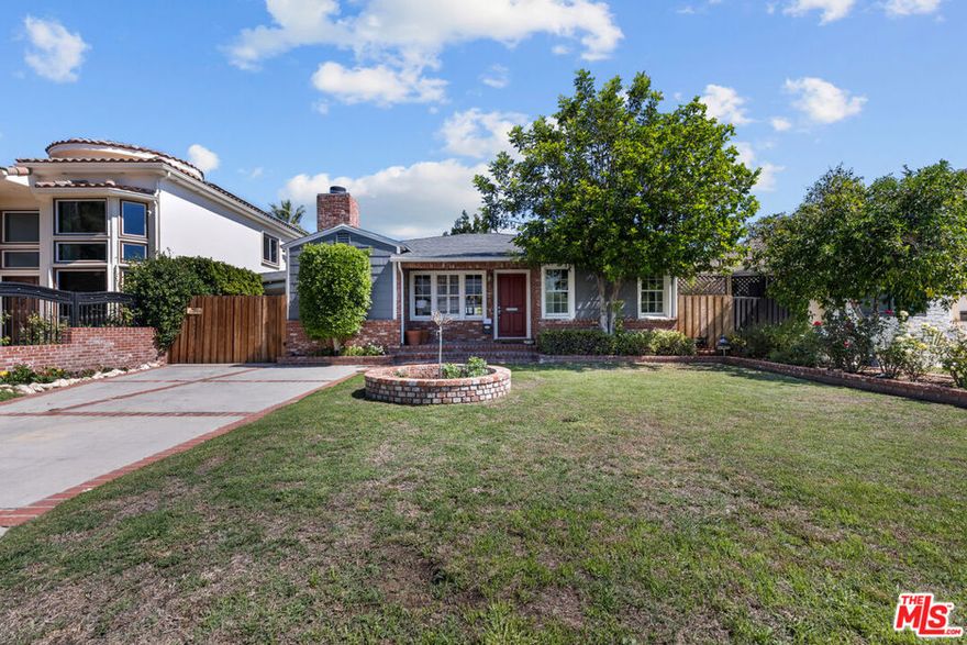 Charming traditional 3 bed / 2 bath home for lease in the heart of Sherman Oaks. This well-maintained furnished residence blends timeless character with thoughtful updates. The light-filled interior features an inviting living room with hardwood floors, a separate formal dining room, and a cozy den with built-ins and a brick fireplace. The spacious kitchen offers ample counter space, wood cabinetry, and stainless steel appliances.The expansive primary suite is a true retreat with vaulted ceilings, a brick fireplace, French doors opening to the backyard, a walk-in closet, and a large en-suite bathroom with a separate shower and soaking tub. Additional bedrooms are well-sized and bright with generous closets. Additional features include a full laundry room and central heat/ac. Step outside to a tranquil, landscaped backyard ideal for entertaining, complete with a built-in outdoor BBQ, built-in garden bench with mature greenery,  and a covered carport provides gated off-street parking. There is also 2 uncovered tandem spots in the driveway, and plenty of street parking. Located on a quiet, tree-lined street moments from Ventura Blvd, shopping, dining, parks, and easy freeway access. A wonderful lease opportunity in a prime Sherman Oaks location.A detached guest house is available for lease at $2,600/month. It may also be rented together with the main residence, offering flexibility for extended living, office, or studio use.