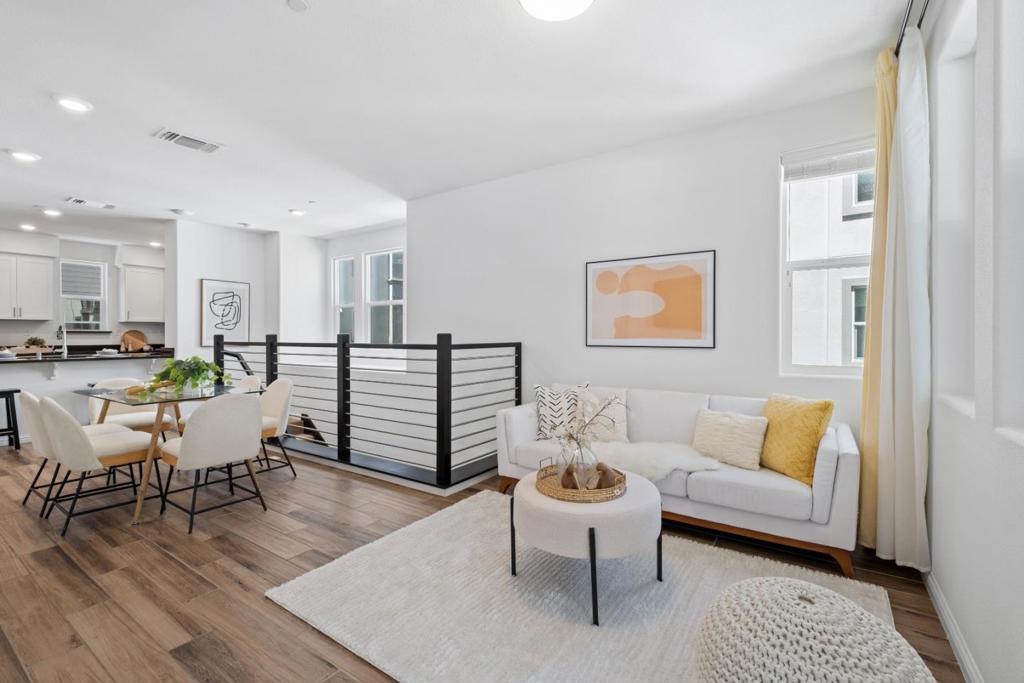 *Beautifully updated east-facing end unit filled with natural light and enhanced privacy with only one shared wall. This two-story home features a smart layout with modern upgrades and two private balconies. *The first floor features a versatile family room that can serve as a home office, gym, or guest lounge, along with a half bathroom. The attached garage offers direct access and additional storage.*Upstairs, the open-concept living and dining area flows seamlessly into a stylish kitchen featuring a sleek gas stove, spacious semi-island, & ample cabinetry. A serene primary suite includes a walk-in closet and spacious dual-sink ensuite. Two additional bedrooms, an in-unit laundry area, and bonus storage on the balcony complete the upper level. *Quick access to I-880, I-680, and Highway 237, making commutes to Silicon Valley tech companies fast and convenient. Minutes from Milpitas BART and VTA stations, and close to Bob McGuire Park, scenic trails, tennis courts, the Great Mall, Trader Joes, Ranch 99, and a wide selection of restaurants. *Top-ranked schools, including Mabel Mattos Elem (10/10), Rancho Milpitas Junior High (9/10), and Milpitas High School (9/10), from GreatSchools Test Scores Rating. Private schools like Stratford and Challenger are nearby.