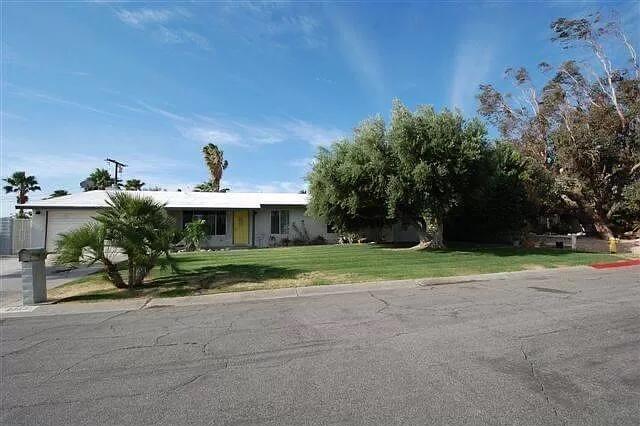 Modern home with open living space and polished concrete floors. Alarm system ~ installed with motion sensors. Ozone pool and spa with indoor controls. Southern facing fully enclosed backyard with mountain views. 2 Car Garage and extra RV parking on side of house. Fireplace. Walk in closet and whirlpool bathtub in Master. Built in closets. Newer Kitchen cabinets, tons of storage with pull out shelves and pantry. Newer stainless steel appliances. Sold As IS. ,