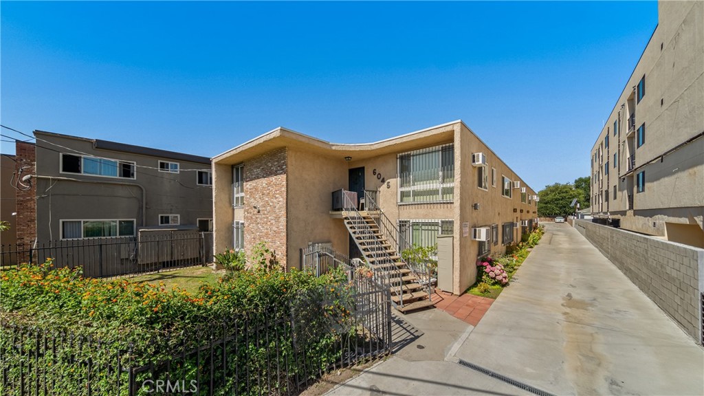 Look no further! Discover this charming 2-bedroom, 1-bath apartment ideally situated on the second floor in North Hollywood. This unit is in a small, 10-unit building, offering a more intimate community feel. This move-in ready unit boasts laminated flooring, fresh paint, and dual-pane windows for energy efficiency and sound reduction. Stay comfortable year-round with the convenience of a wall AC unit. You'll also appreciate having two dedicated parking spaces and access to a community washer and dryer on-site. Enjoy the ultimate convenience of being adjacent to the NoHo Arts District, putting you steps away from an array of trendy shops, acclaimed restaurants, and vibrant entertainment options. The apartment is in pristine condition and ready for you to make it your own. Section 8 may be possible. Don't miss out on this fantastic opportunity! Call us today to schedule a showing and experience all that this North Hollywood gem has to offer