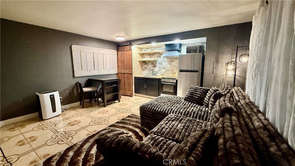 Photo of 7904 Laurel Canyon Blvd #12, North Hollywood, CA 91605 (MLS # SR25239902)