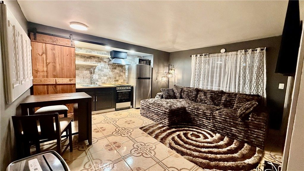Photo of 7904 Laurel Canyon Blvd #12, North Hollywood, CA 91605 (MLS # SR25239902)