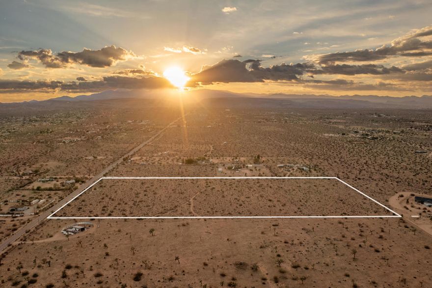 Here's a great opportunity to secure an impressive 20-acre parcel in one of the desert's most desirable settings. Perched on the Mesa, this expansive property delivers sweeping views and a location that blends privacy with convenience. The land is dotted with beautiful, mature Joshua Trees, spaced to preserve the natural beauty while still allowing ample room for future development. Whether you're envisioning a private desert sanctuary, a custom estate, or exploring subdivision opportunities, this parcel provides the flexibility to bring your vision to life. Zoned HV/RL-5, it allows for multiple options depending on your goals. Easily accessible right off Aberdeen Dr., a paved road, and with utilities nearby (buyer to verify), this property makes for an ideal balance of seclusion and accessibility. Large parcels in this location are increasingly rare--and at this price, it's an exceptional opportunity you won't want to miss!