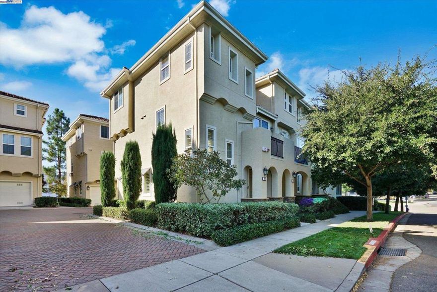 Immaculate home that shows true pride of ownership!  Beautifully maintained end-unit corner condo offering both comfort and convenience. The open-concept floor plan features abundant natural light, fresh designer paint, recessed lighting, and beautiful wood plantation shutters throughout, including the garage.  The spacious kitchen is equipped with stainless steel appliances—refrigerator, stove, microwave, dishwasher, and washer/dryer—all included. It also features granite countertops, a breakfast bar, and is pre-wired for surround sound, making it perfect for both everyday living and entertaining.  The primary suite boasts a luxurious ensuite bath and a generous walk-in closet. Added conveniences include an attached garage, ample storage, and in-unit laundry. Enjoy peaceful outdoor scenery and views from this private end unit that does not face neighboring doors.  Located within walking distance of Cayetano Park, sports fields, and dog parks, and just minutes from Costco, shopping, dining, downtown, and freeway access.  Residents enjoy resort-style amenities including a sparkling pool, spa, clubhouse, and fitness center—all within the sought-after Montage Community.