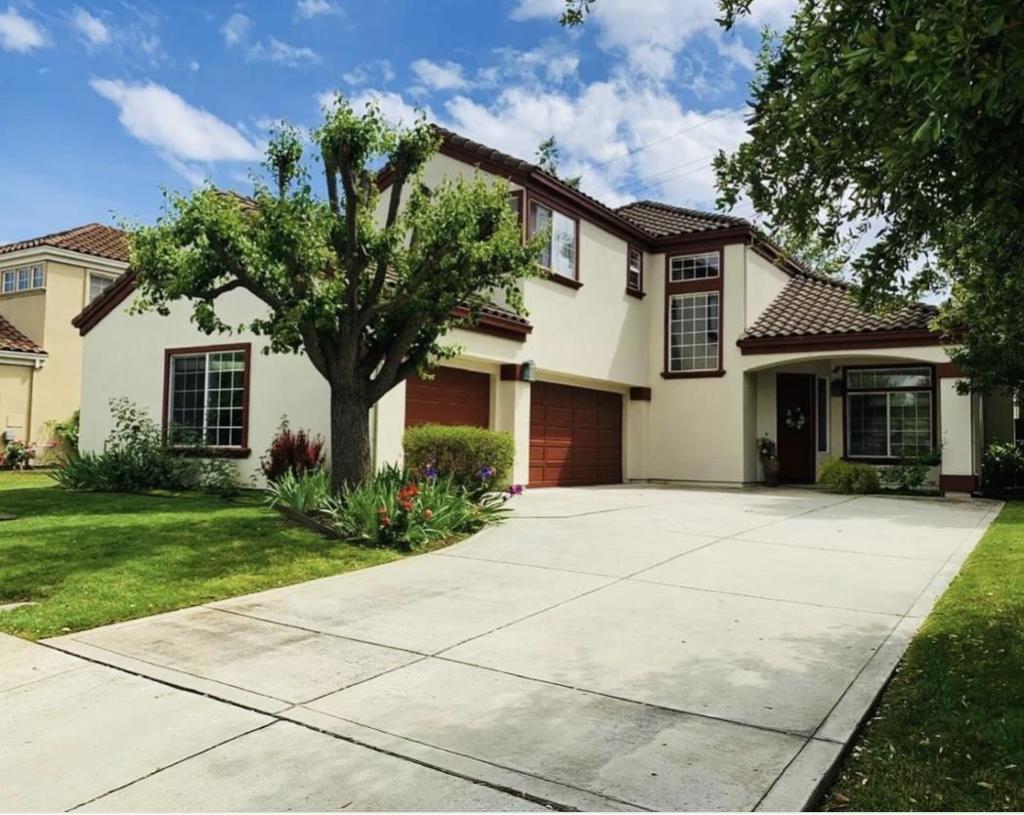 Exceptional Two-Story Home in the Oak Creek Subdivision Welcome to this beautifully appointed, move-in ready home offering a spacious and functional floor plan with 5 bedrooms and 3 bathrooms including a convenient downstairs bedroom and full bathroom ideal for guests or multi-generational living. Located in the highly desirable Oak Creek neighborhood with no HOA, residents enjoy direct access to scenic walking trails and a community park featuring basketball and tennis courts, a playground, and a BBQ area. At the heart of the home is the kitchen with a center island, and a generous walk-in pantry. The breakfast bar overlooks the inviting family room and opens seamlessly to the private backyard. Host gatherings in the formal living and dining rooms, or unwind outdoor. The primary suite offers vaulted ceilings, a spa-inspired in suite bath with a jetted soaking tub, separate shower, and a spacious walk-in closet. Ideally located with convenient access to major freeways, scenic backroads, and just minutes from vibrant Downtown Morgan Hill where you'll find shops, restaurants, and entertainment. This is an exceptional opportunity to own a meticulously maintained home in one of Morgan Hills most desirable neighborhoods.